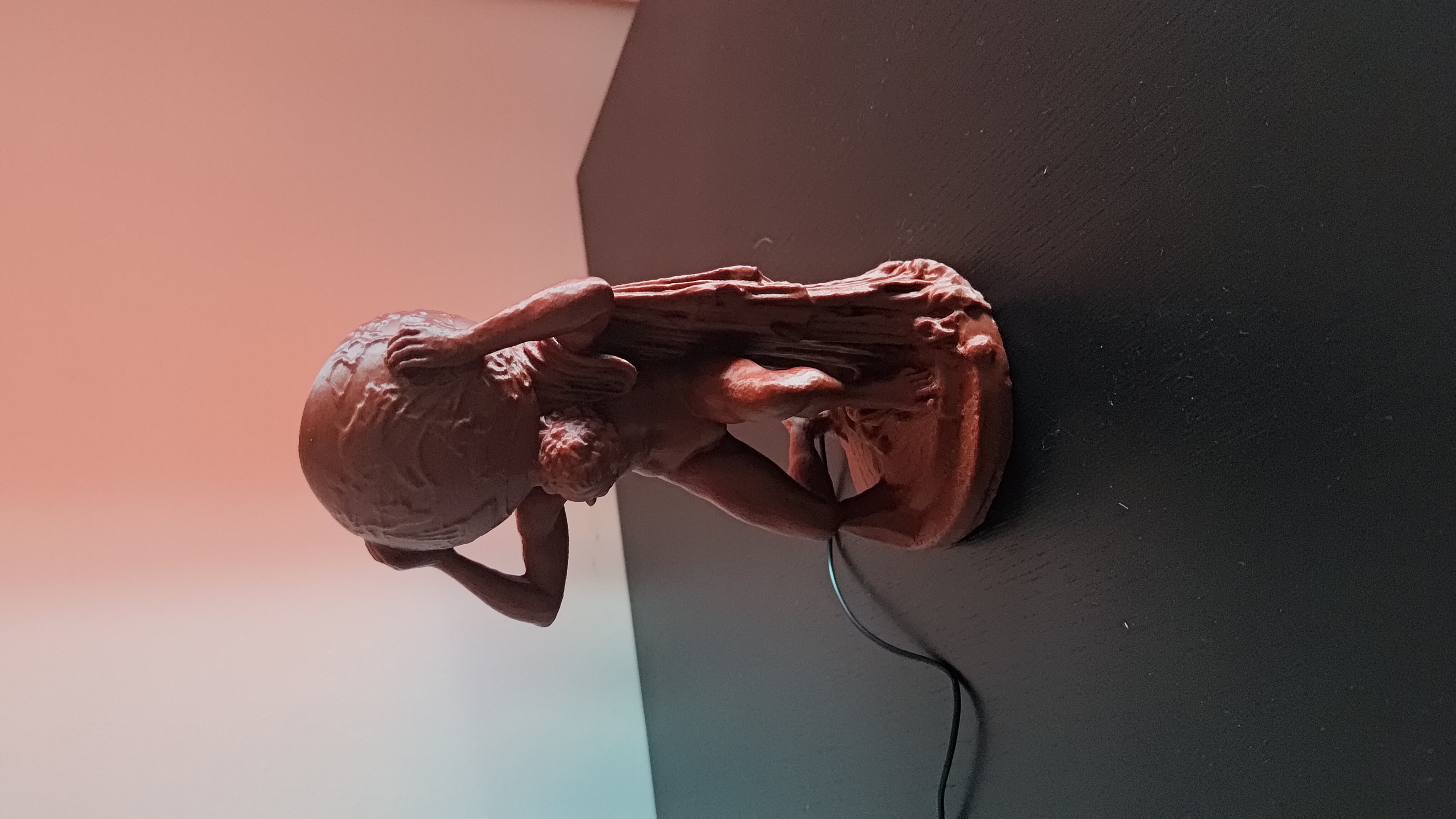 Atlas holding the World Lamp